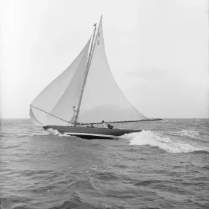 The 7 Metre yacht Pinaster (K8) sailing with spinnaker, 1913. Creator: Kirk & Sons of Cowes The 7 Metre yacht Pinaster (K8) sailing with spinnaker, 1913. Creator: Kirk & Sons of Cowes