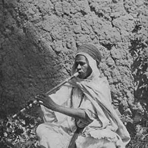 Algerian native flute player, 1912