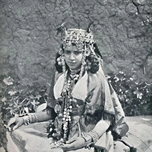 An Algerian woman in gala costume, 1912. Artist: Neurdein freres