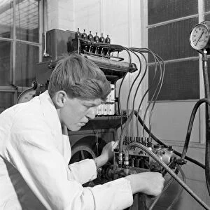 Apprentice at work, Globe & Simpson auto electrical workshop, Nottingham, Nottinghamshire, 1961