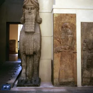 Assyrian sculpture of a human-headed winged bull at the palace gateway, Khorsabad, 8th century BC