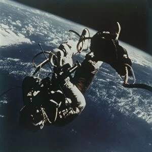 Astronaut Edward White performs the first American spacewalk, 3 June 1965. Creator