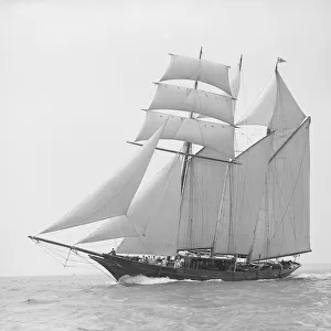 The auxiliary schooner La Cigale sailing close-hauled, 1913. Creator: Kirk & Sons of Cowes