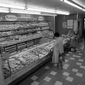 The bakery counter at the ASDA supermarket in Rotherham, South Yorkshire, 1969. Artist