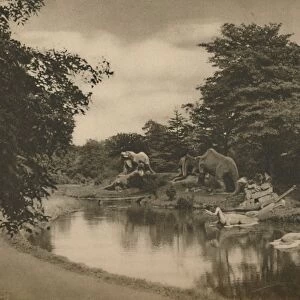 Where the Beasts of Prehistory Lurk By the Lake in the Palace Grounds, c1935. Creator: Unknown