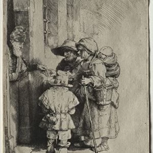 Beggars Receiving Alms at the Door of a House, 1648. Creator: Rembrandt van Rijn (Dutch