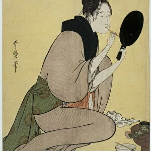 Bijin-ga. Girl applying makeup to her lips. Artist: Utamaro, Kitagawa (1753-1806)