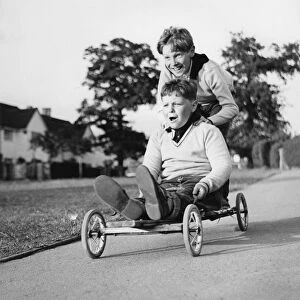 Boys playing with a home-made go-kart, Horley, Surrey, 1965