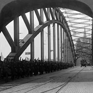 British troops crossing the bridge over the Rhine, Cologne, Germany, 1918-1926. Artist: Realistic Travels Publishers