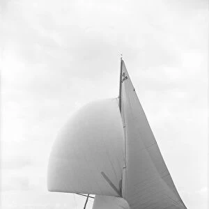 The US built 12 Metre class Vim sailng with spinnaker, 1939. Creator: Kirk & Sons of Cowes