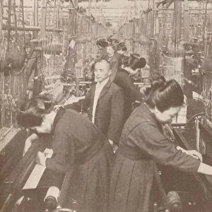 The busy interior of a flourishing silk factory in Japan, 1907