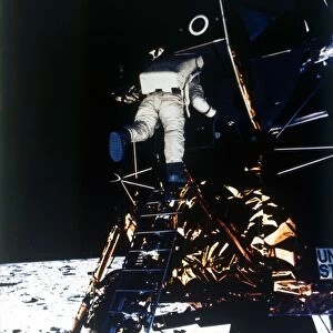 Buzz Aldrin descends from the Lunar Module, Apollo II mission, July 1969. Creator: Neil Armstrong