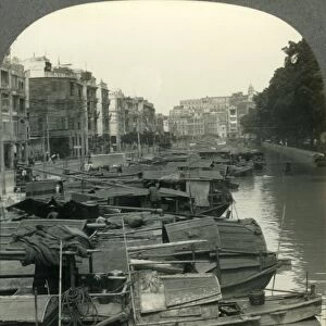 The Canal between Canton and the Island of Shameen, China, c1930s. Creator: Unknown