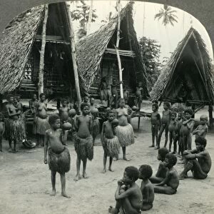 Carrying Water in Coconut Shells - A Village Scene in New Guinea, c1930s. Creator: Unknown