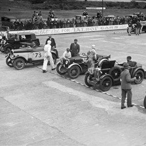 Cars on the starting grid at the JCC Members Day, Brooklands, 4 July 1931 Artist: Bill Brunell