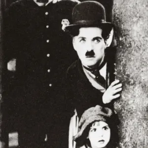 Charlie Chaplin and Jackie Coogan in The Kid, 1921