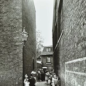 Children in an alleyway, Upper Ground Place, Southwark, London, 1923