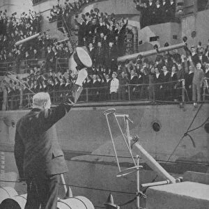 Churchill responds to the cheers from the crew of HMS Prince of Wales, 1941