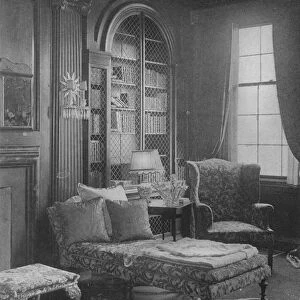 Comfortable corner in the library showing bookcase, house of Miss Anne Morgan, New York City, 1924