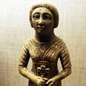 Coptic figure of woman clasping a crucifix, Sheik Ibada, Upper Egypt, 350-400
