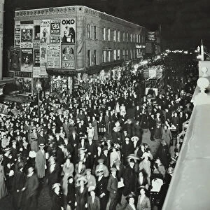Crowds of shoppers in Rye Lane at night, Peckham, London, 1913