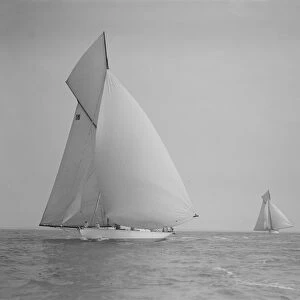 The cutter Onda sailing under spinnaker, 1911. Creator: Kirk & Sons of Cowes