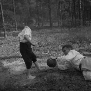 Dmitri Shostakovich plays football with his son Maxim in Komarovo, 1947. Creator: Varzar Shostakovich, Nina Vasilyevna (1909-1954) Dmitri Shostakovich plays football with his son Maxim in Komarovo, 1947. Creator: Varzar Shostakovich, Nina Vasilyevna (1909-1954)