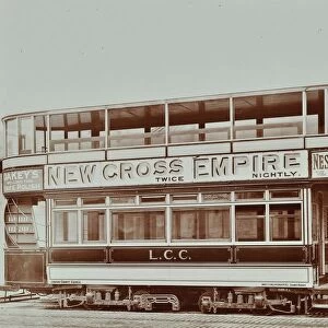 Double-decker electric tram with advertisement for the New Cross Empire, 1907