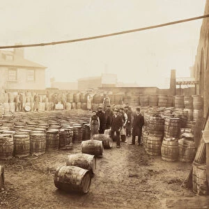 Ebano bitumen stored at Elizabeth Wharf, Limehouse, London, c1900