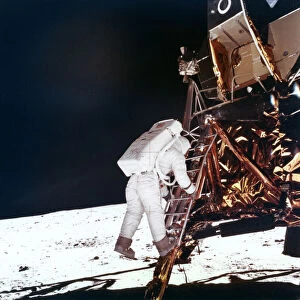 Edwin Buzz Aldrin descends the steps of the Lunar Module ladder to walk on the Moon, 1969. Artist: NASA