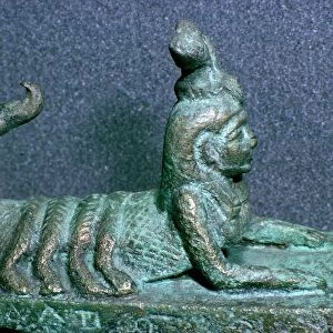 Egyptian lid of a bronze receptacle for a dead scorpion