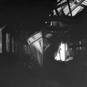 Egyptian motor launch in shed, 1911. Creator: Kirk & Sons of Cowes Egyptian motor launch in shed, 1911. Creator: Kirk & Sons of Cowes