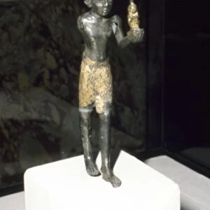 Egyptian Statuette of King Seti I offering image of Maat, New Kingdom, c13th century BC