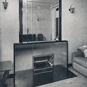Electric fireplace and overmantel by James Clark & Son Ltd. 1940