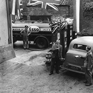 Esso garage at the end of petrol rationing 1950. Creator: Unknown