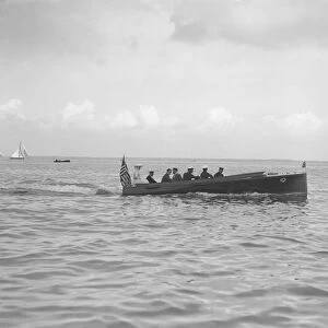 F M Singers motor launch under way, 1911. Creator: Kirk & Sons of Cowes
