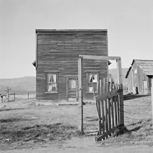 Farmer saloon and stagecoach tavern... the Ola self help sawmill co-op, Gem County, Idaho, 1939. Creator: Dorothea Lange