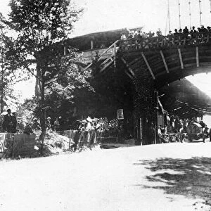 FIAT of Luigi Storero going under a bridge during the 1904 Gordon Bennett Cup, Homburg