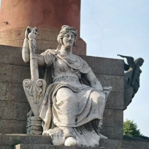 Figure at the base of the Rostral Pillar on Vassilievsky Island