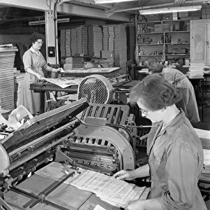 A folding machine in a printworks, Mexborough, South Yorkshire, 1959