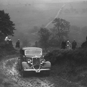 Ford V8 saloon of WT Platt competing in the MCC Sporting Trial, 1935. Artist: Bill Brunell