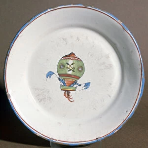 A French faience plate with aeronauts with flags, 1785