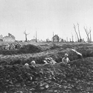 French infantry establishing fallback positions in front of a ruined farm, Picardy, France, 1918