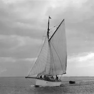 The gaff rig sailboat Bunty close-hauled, 1921. Creator: Kirk & Sons of Cowes The gaff rig sailboat Bunty close-hauled, 1921. Creator: Kirk & Sons of Cowes