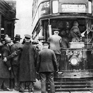 Getting on to a tram at Blackfriars, London, 1926-1927