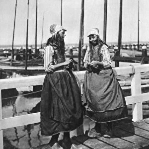 Two girls on the landing stage, Marken, Netherlands, c1934