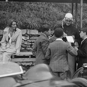 Goldie Gardner signing autographs at the Irish Grand Prix, Phoenix Park, Dublin, 1930