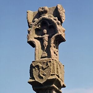 Gothic pillar-cross with the earliest known three legs of Man, 14th century