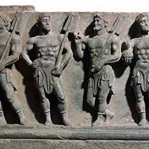An indian sculpture of a group of marine deities, 1st century