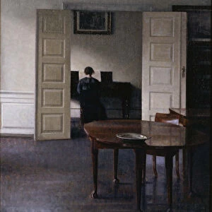 Interior with Ida Playing the Piano. Artist: Hammershoi, Vilhelm (1864-1916)